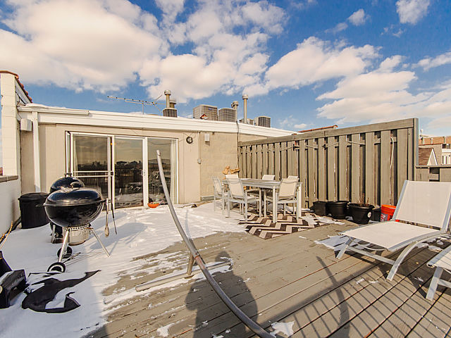 2127 West Rice Street, Unit 4W Chicago, IL 60622 - Photo 13 of 25 a view of a dinning table and chairs in the patio