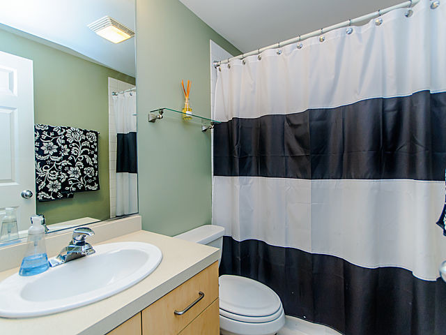 2127 West Rice Street, Unit 4W Chicago, IL 60622 - Photo 23 of 25 a bathroom with a sink a toilet and shower