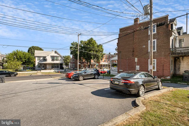 a car parked in front of a house