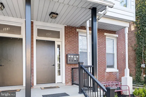 a view of balcony with furniture