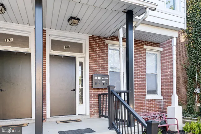 a view of balcony with furniture