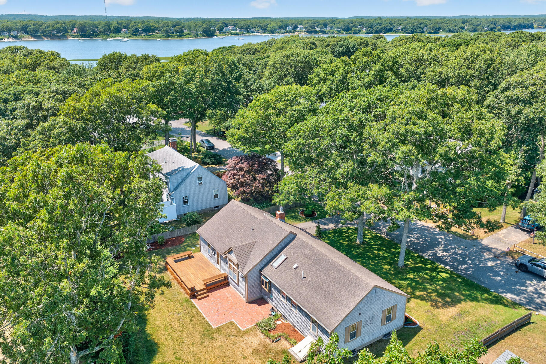 40 Cooper Road East Falmouth, MA 02536 - Photo 2 of 50 02-DJI_20260709020107_0122_D