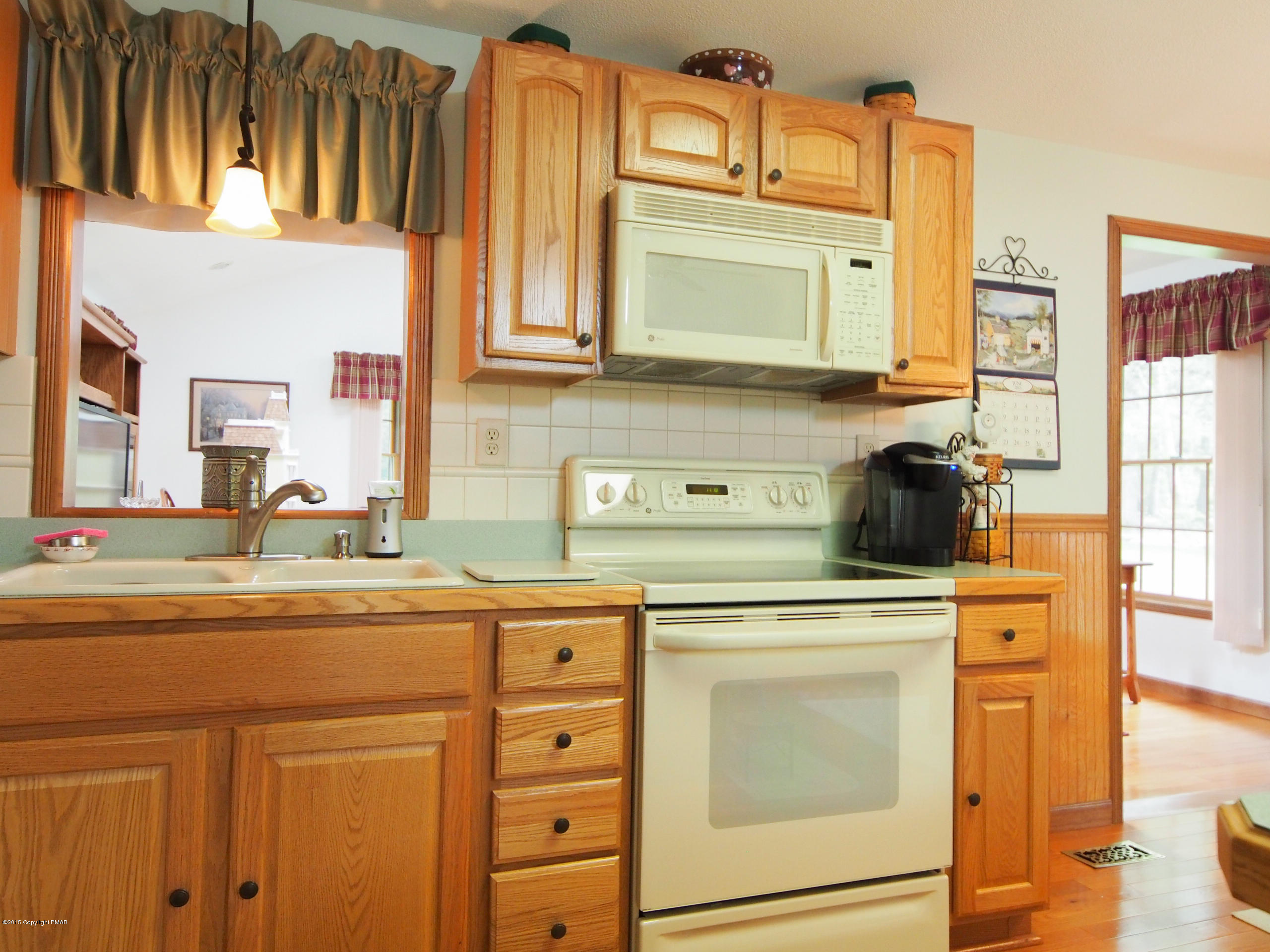 3 Fern Path Road Stroudsburg, PA 18360 - Photo 9 of 35 a kitchen with cabinets appliances and a sink