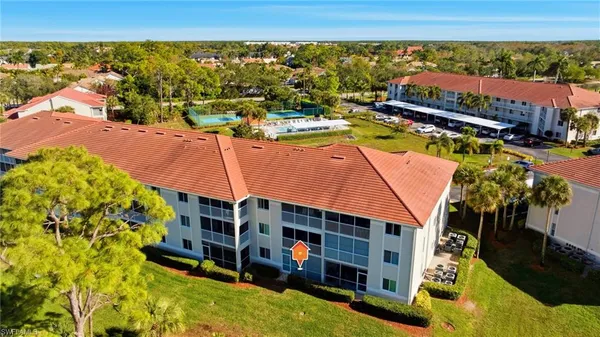 an aerial view of a house with a garden