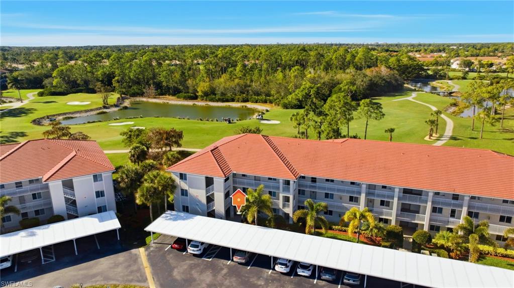 1001 Eastham Way, Unit C102 Naples, FL 34104 - Photo 27 of 41 a view of a city from a terrace