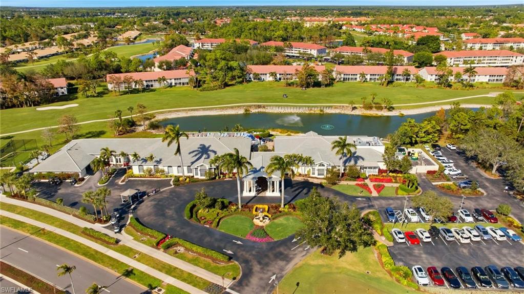 1001 Eastham Way, Unit C102 Naples, FL 34104 - Photo 36 of 41 an aerial view of residential houses with outdoor space