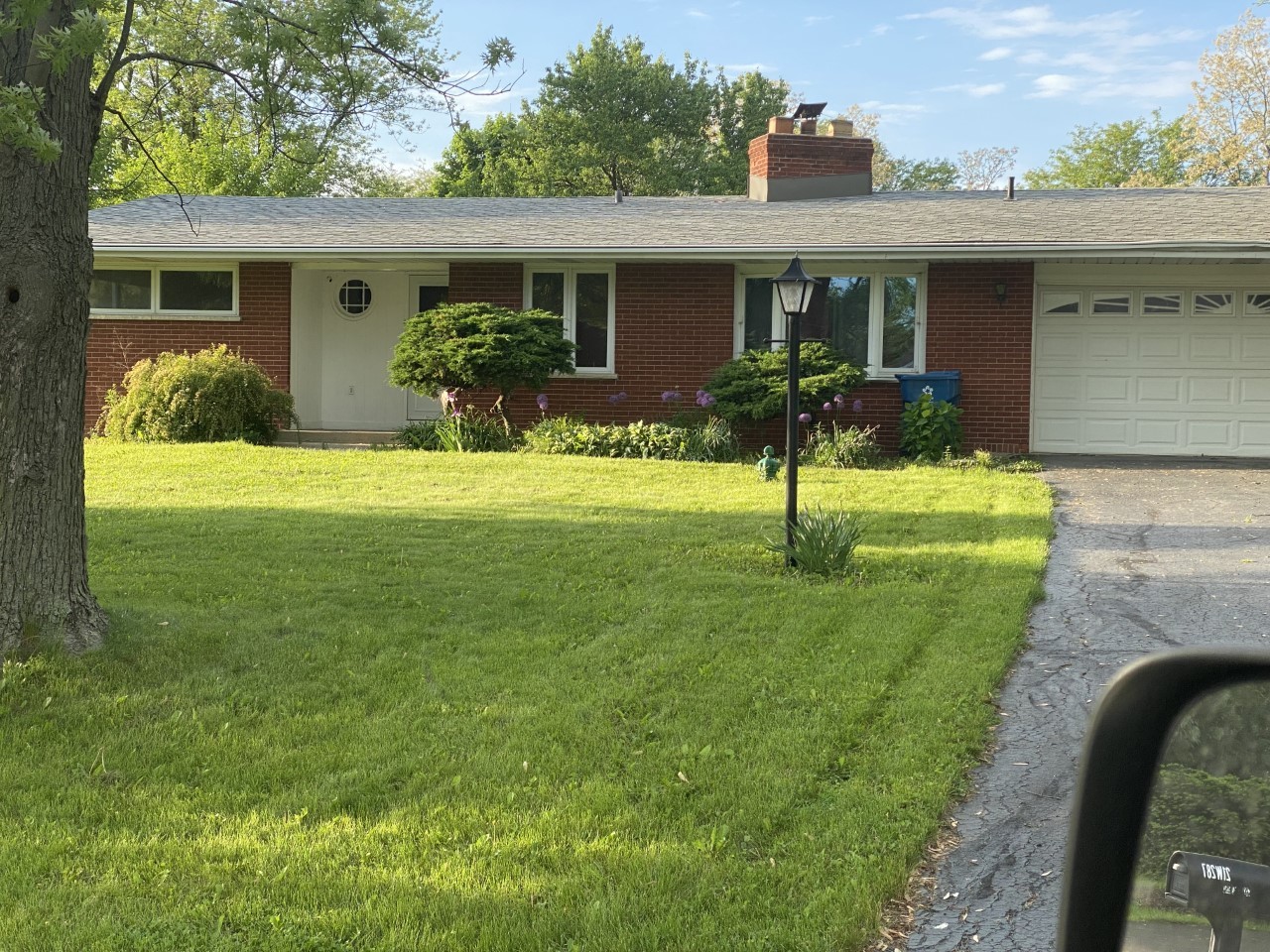 21W270 Temple Drive Itasca, IL 60143 - Photo 3 of 15 a front view of house with yard and green space