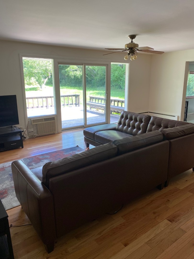 21W270 Temple Drive Itasca, IL 60143 - Photo 7 of 15 a living room with furniture window and wooden floor