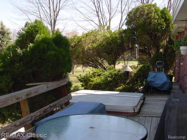 11429 Gage Road Holly, MI 48442 - Photo 15 of 18 hot tub w 2nd half of deck