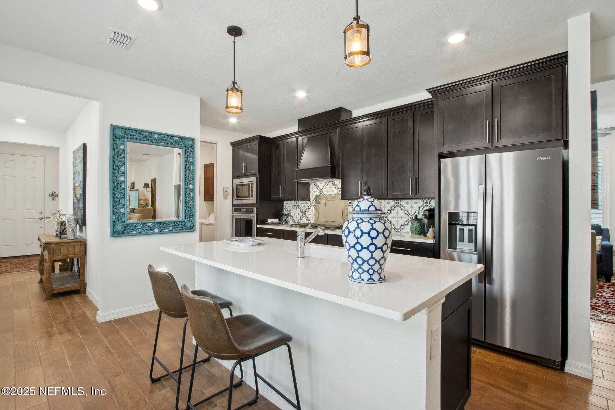 554 Continuum Loop Yulee, FL 32097 - Photo 16 of 102 Kitchen:Halway