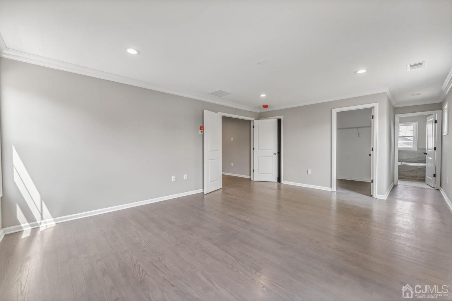 17 Matson Road Edison, NJ 08817 - Photo 12 of 20 a view of an empty room with wooden floor
