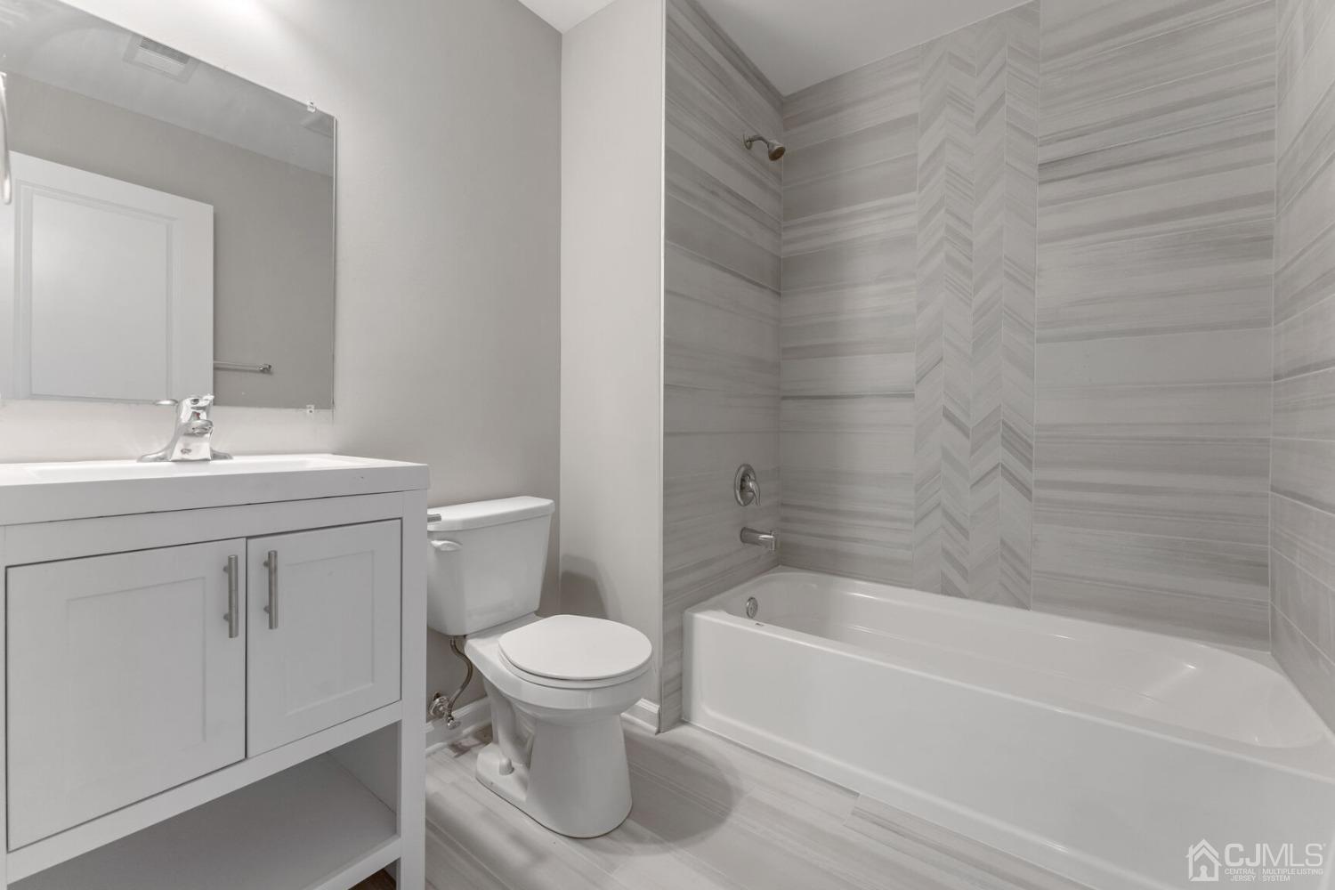 17 Matson Road Edison, NJ 08817 - Photo 16 of 20 a bathroom with a sink toilet and shower