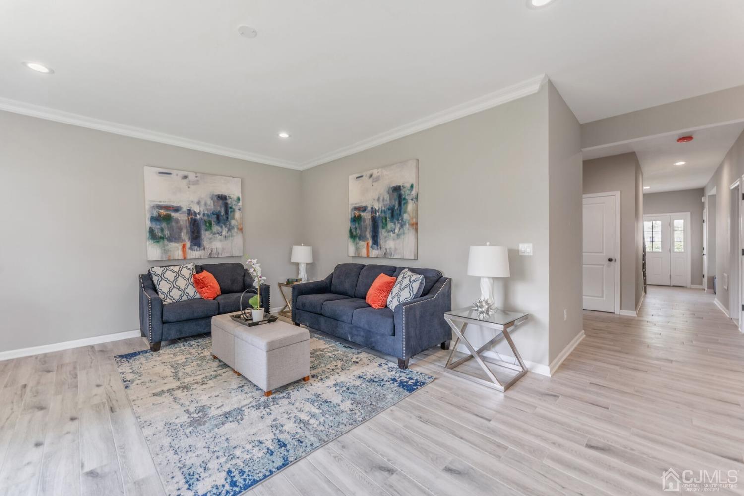 17 Matson Road Edison, NJ 08817 - Photo 3 of 20 a living room with furniture and wooden floor