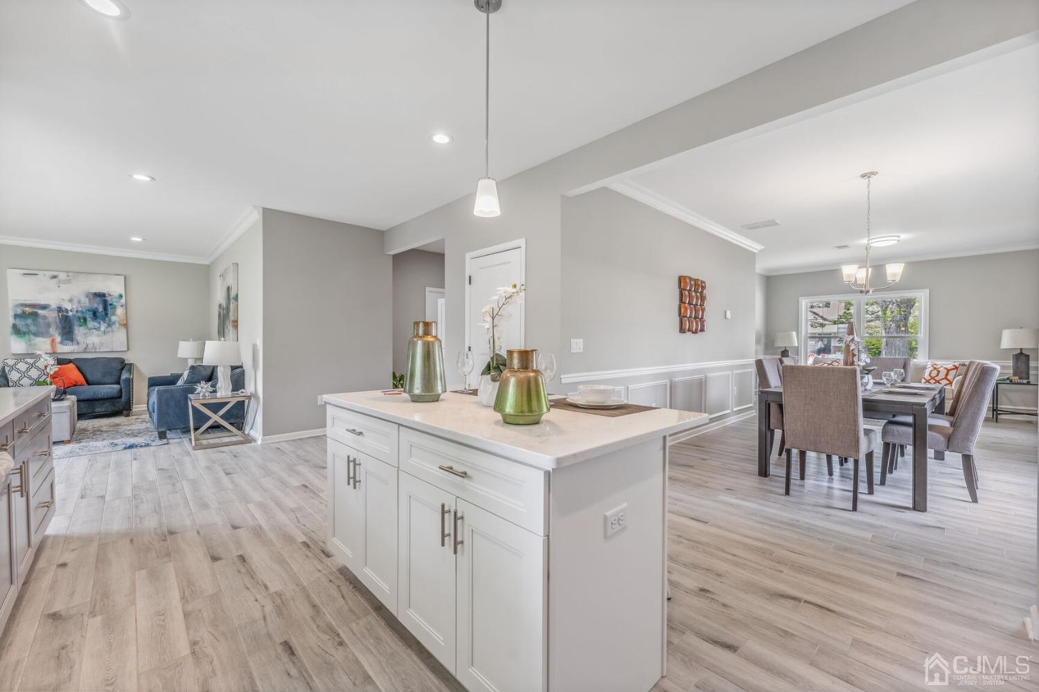 17 Matson Road Edison, NJ 08817 - Photo 5 of 20 a kitchen with stainless steel appliances granite countertop wooden floors and table