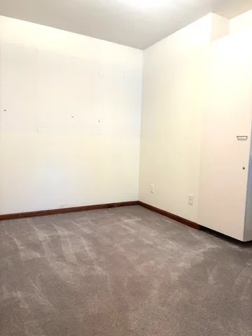 a spacious bathroom with a tub and shower