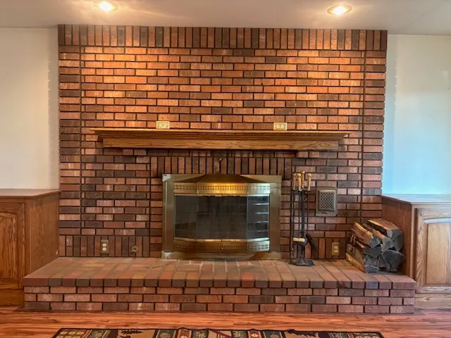 a view of livingroom with furniture and wooden floor