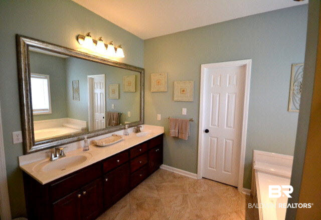 1640 Augusta Drive West Mobile, AL 36695 - Photo 13 of 25 Beautiful vanity in master makes it easy for both of you to get ready in the mornings!