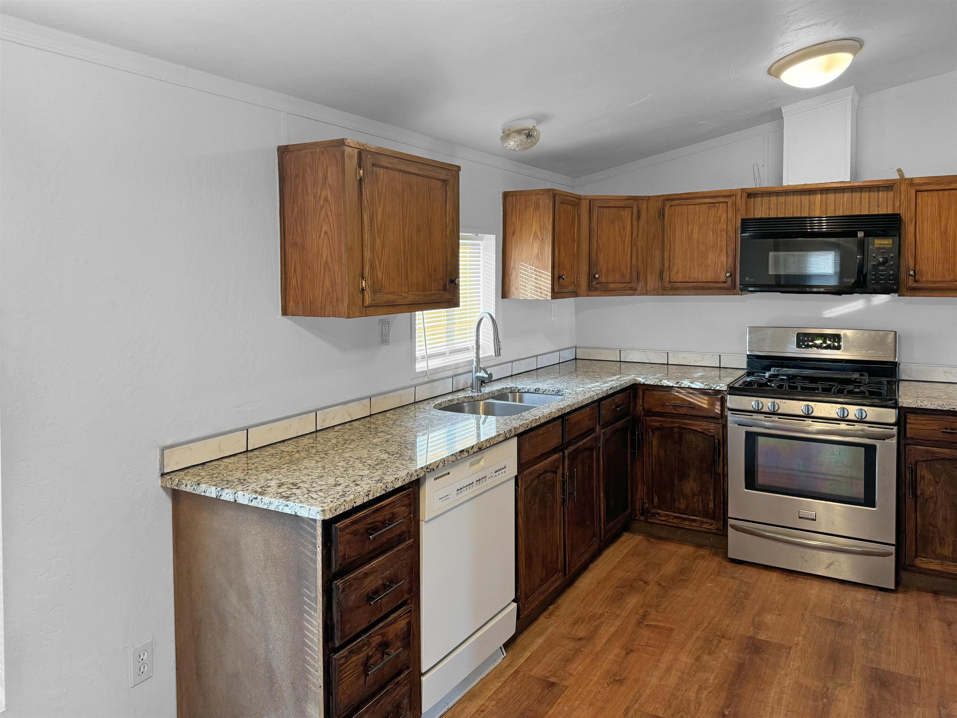 424 32 Road, Unit 408 Clifton, CO 81520 - Photo 2 of 10 Lots of Cabinet storage with Granite countertops.