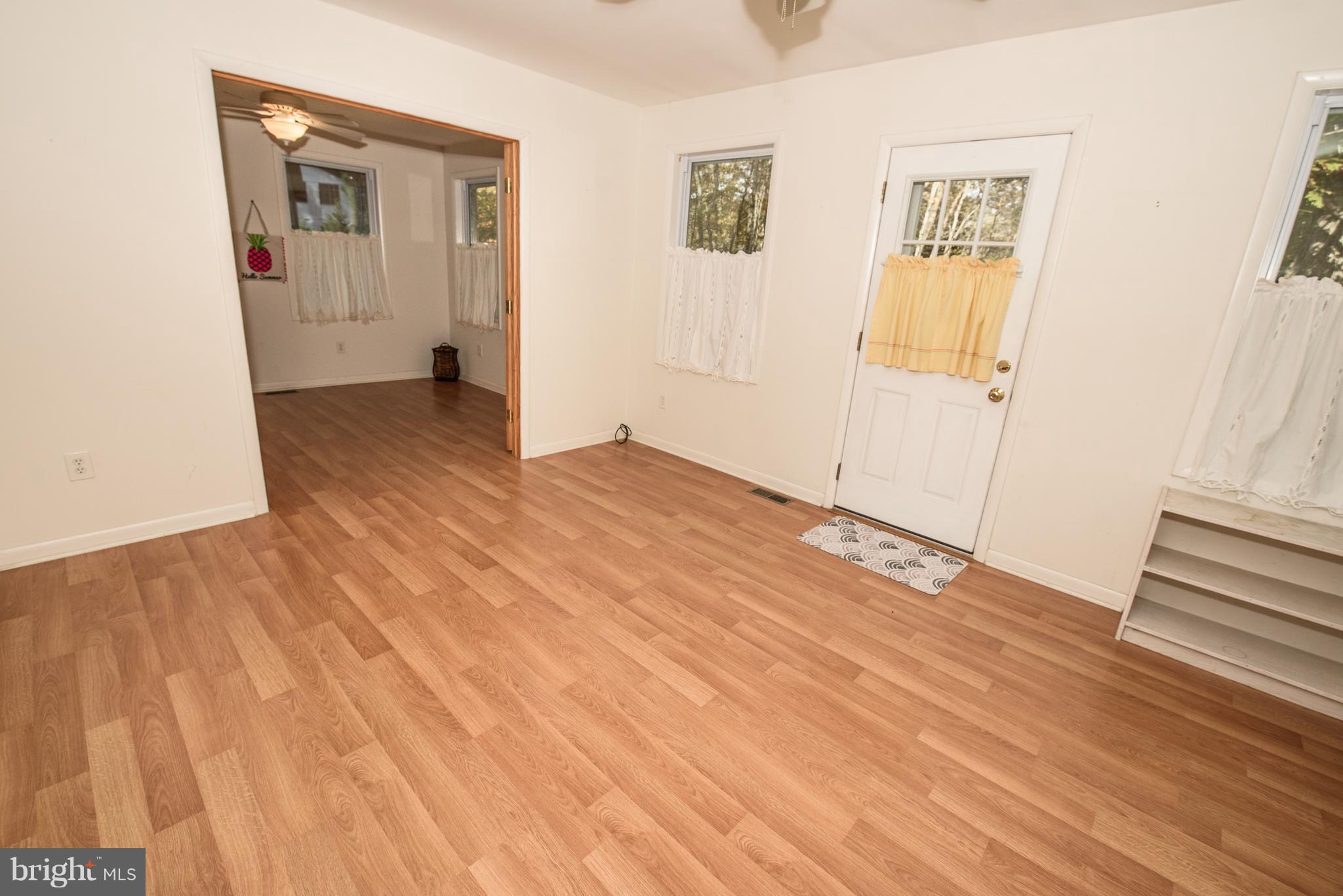 28 Sandyhook Road Ocean Pines, MD 21811 - Photo 27 of 51 Sunroom off Den and Kitchen