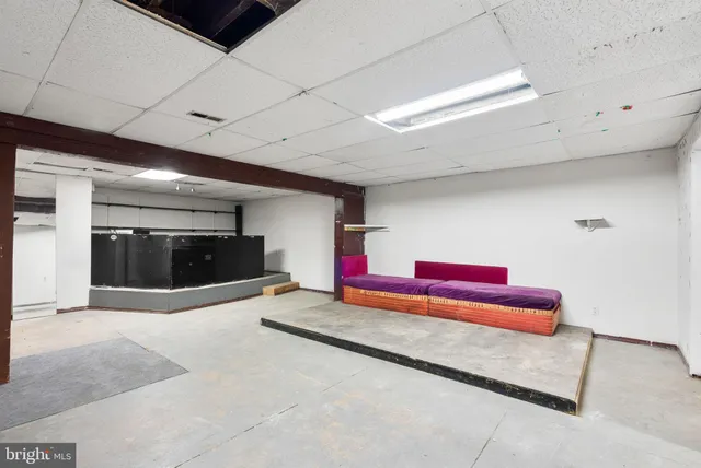 a view of balcony with wooden floor and fence