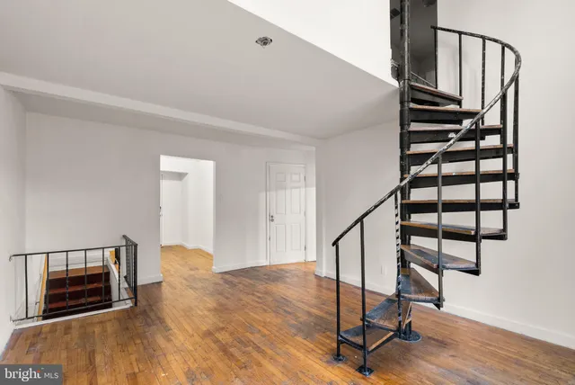 a view of entryway with wooden floor