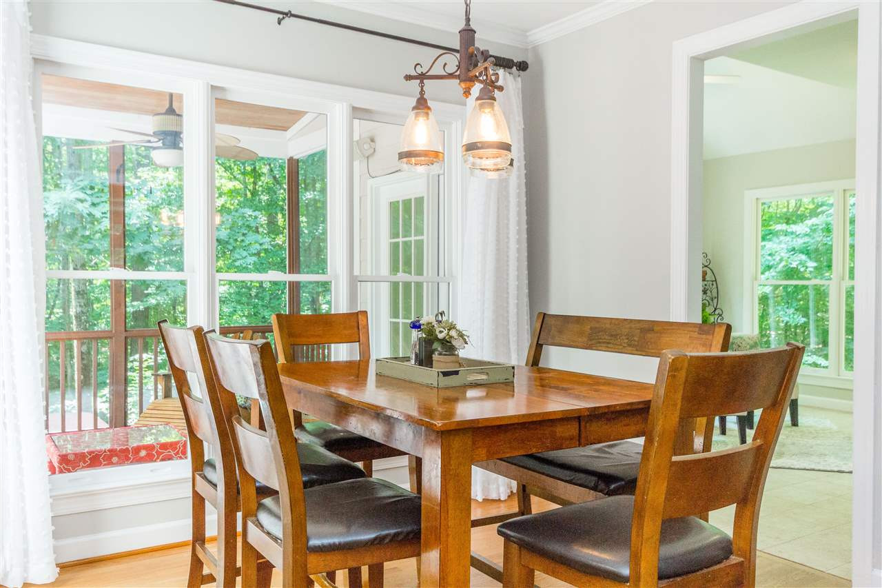 2720 Dray Court Raleigh, NC 27613 - Photo 6 of 25 Breakfast Area overlooks the screened in porch and sun room. Breakfast Area
