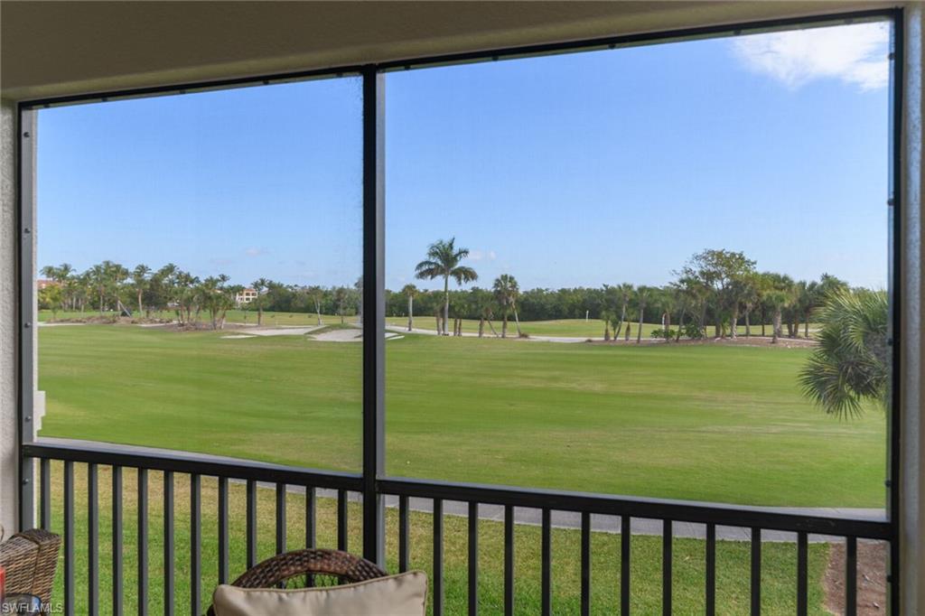 1286 Rialto Way, Unit 9202 Naples, FL 34114 - Photo 29 of 49 Expansive golf course views from the screened lanai.