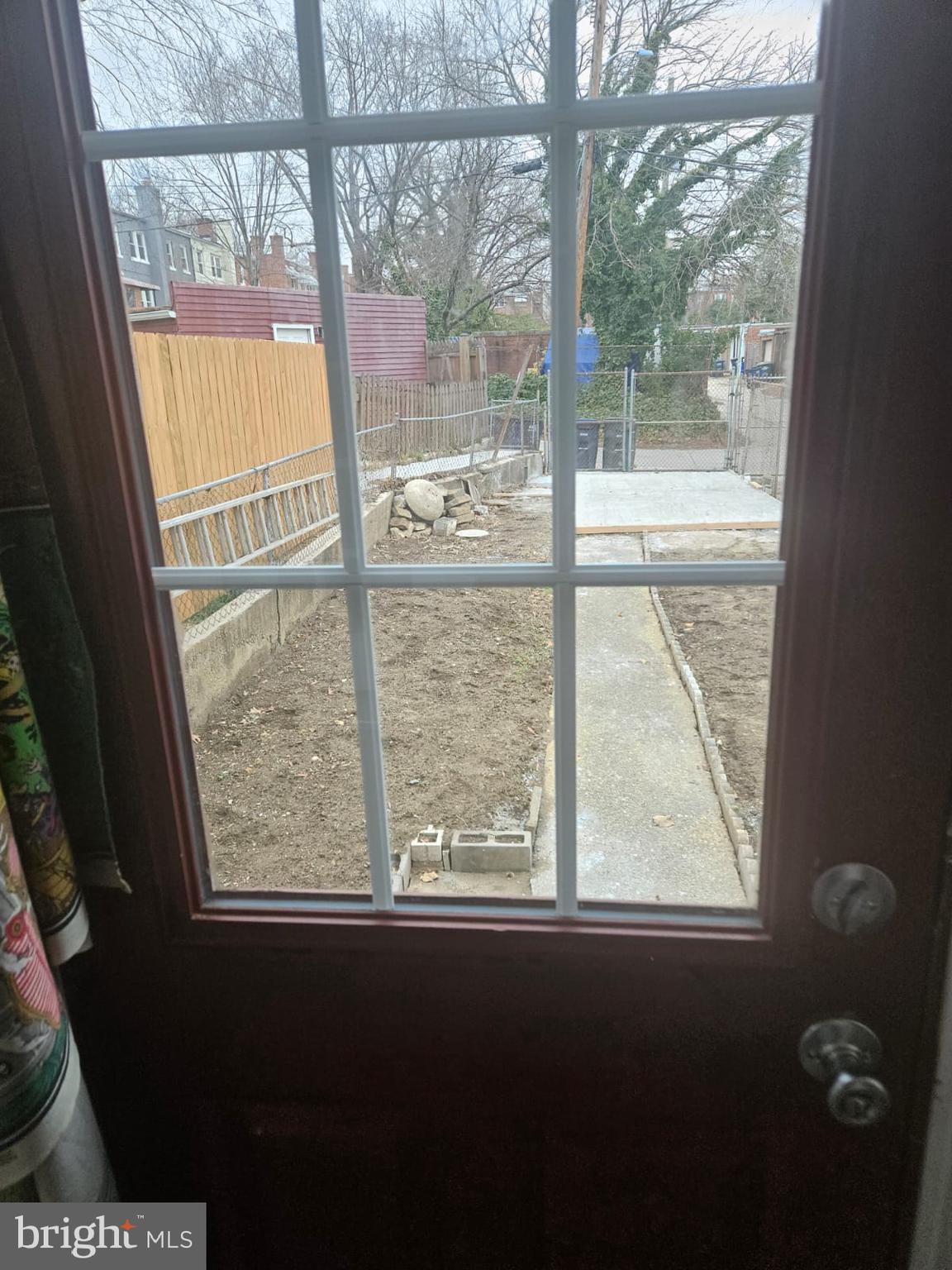 5319 3rd Street Northwest Washington, DC 20011 - Photo 13 of 15 a view of a glass door with a tree in it