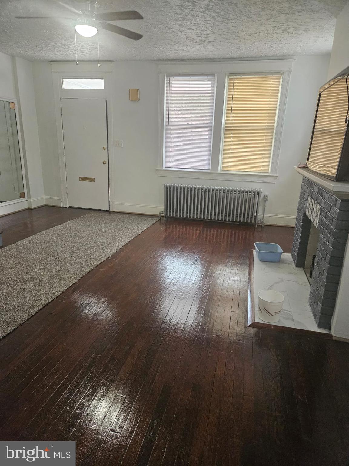 5319 3rd Street Northwest Washington, DC 20011 - Photo 9 of 15 an empty room with wooden floor and windows