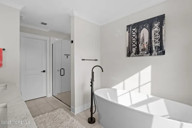 a view of balcony with two chairs and a table