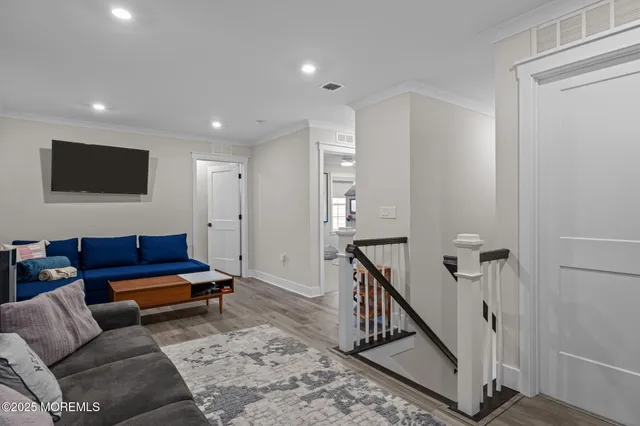 an aerial view of multiple houses with yard