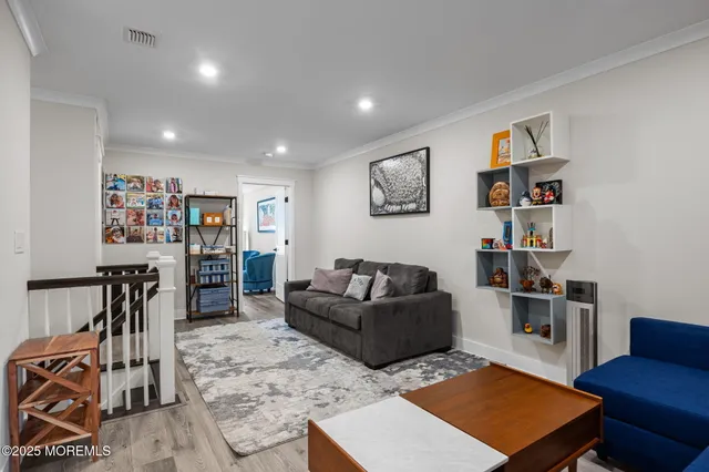 an aerial view of a house with a garden