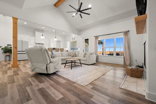 a living room with furniture and a rug