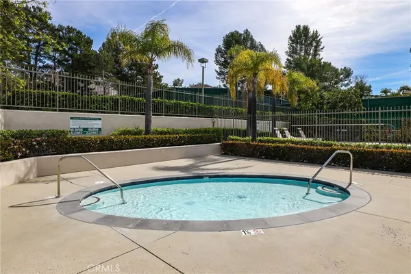 a view of swimming pool with trees