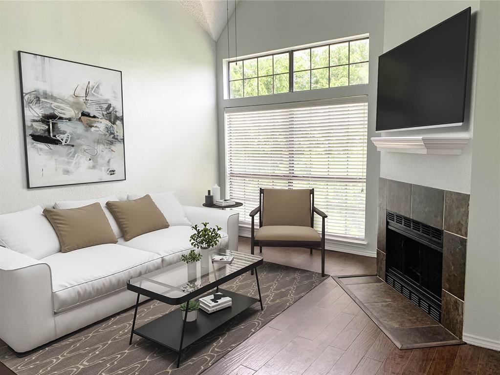 9601 Forest Lane, Unit 1024 Dallas, TX 75243 - Photo 2 of 28 a living room with furniture a flat screen tv and a fireplace