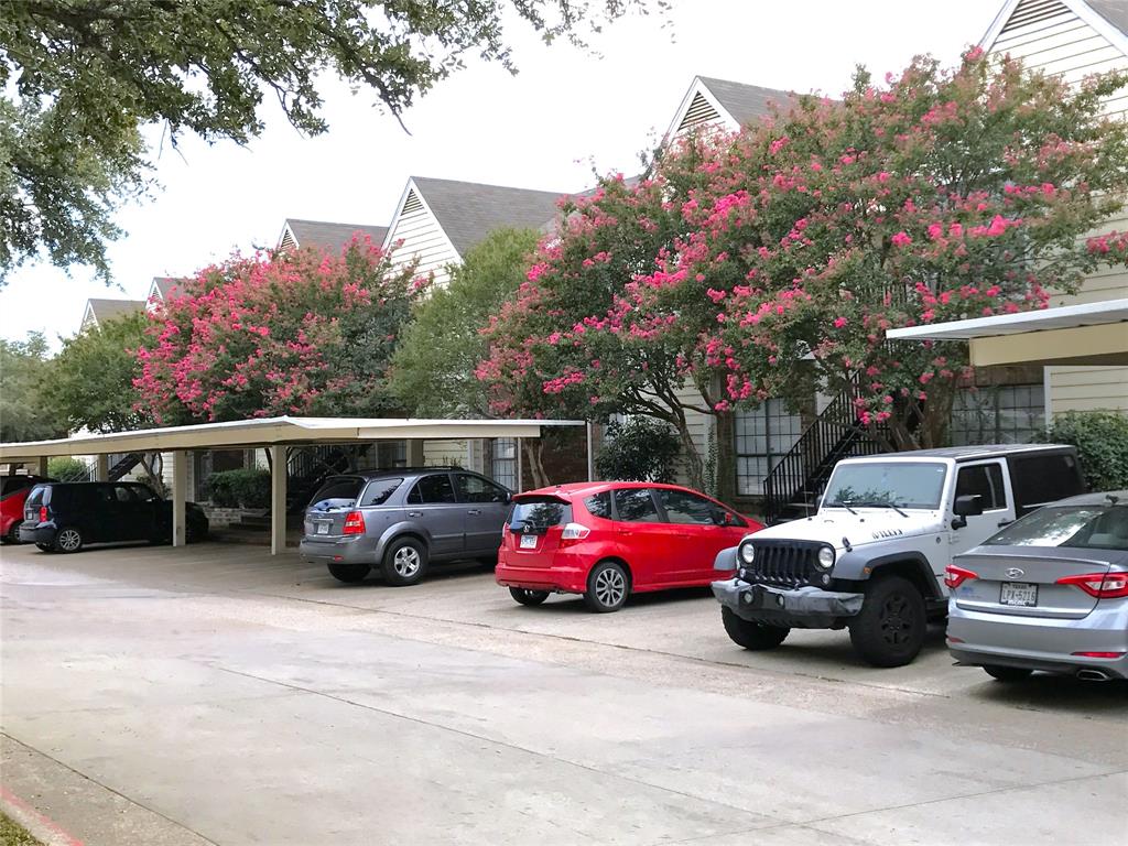 9601 Forest Lane, Unit 1024 Dallas, TX 75243 - Photo 28 of 28 a view of street with parked cars
