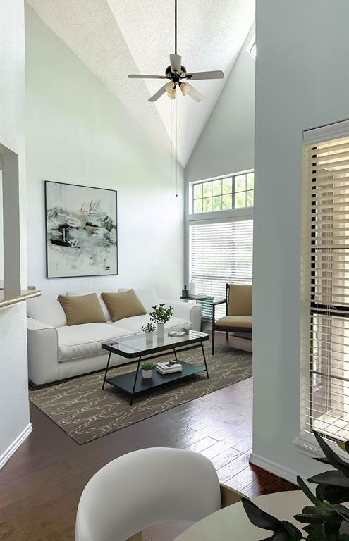 9601 Forest Lane, Unit 1024 Dallas, TX 75243 - Photo 3 of 28 a living room with furniture and a window