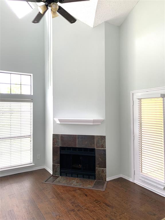 9601 Forest Lane, Unit 1024 Dallas, TX 75243 - Photo 7 of 28 a view of empty room with wooden floor and fan