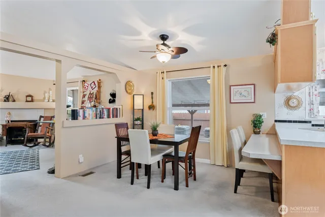a view of a dining room with furniture