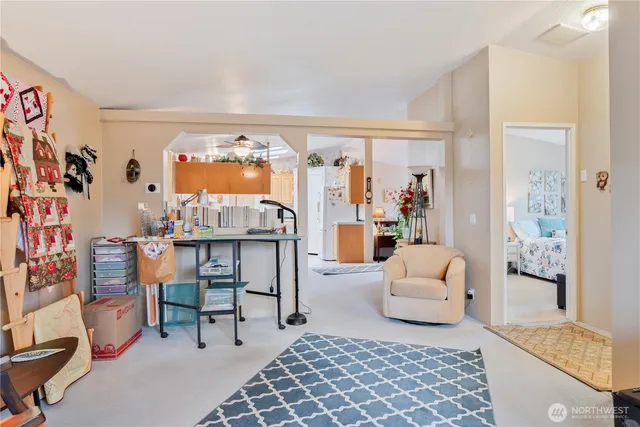 a living room with furniture and a table