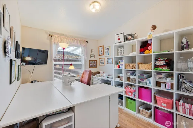 a living room with lots of furniture and a flat screen tv