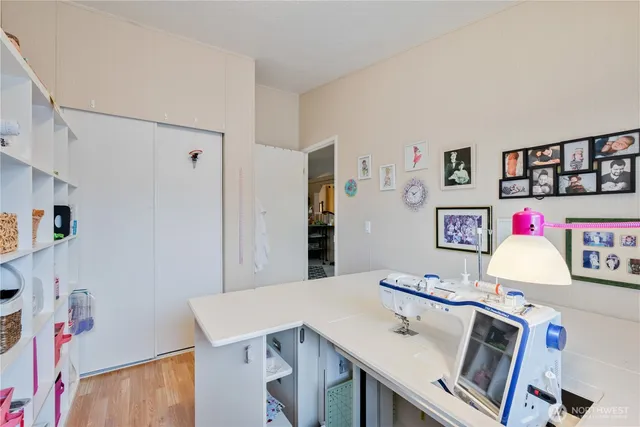 a view of kitchen island with stainless steel appliances