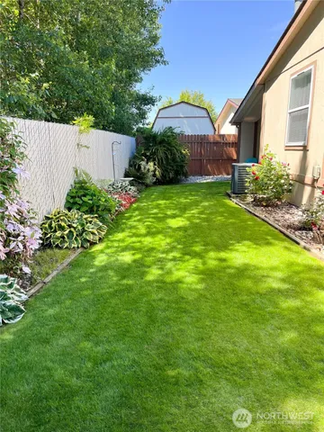 a view of a house with a park