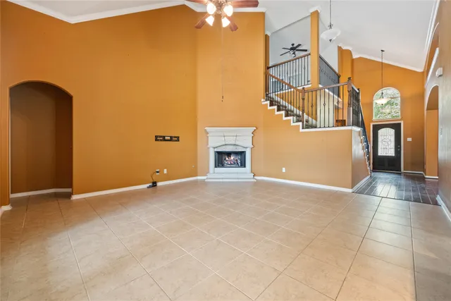 an empty room with a fireplace