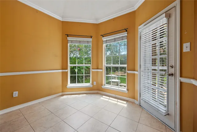 a view of a room with a large window