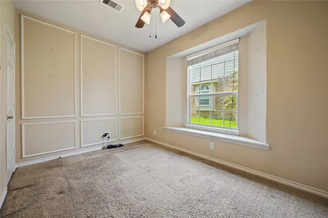 an empty room with windows