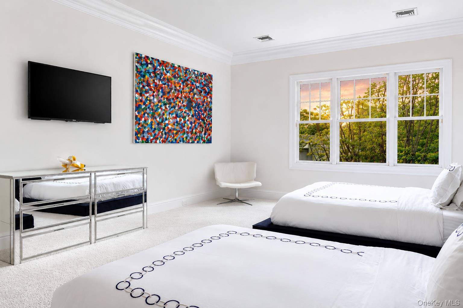 486 Middle Line Highway Bridgehampton, NY 11976 - Photo 18 of 28 a bedroom with a bed and a flat screen tv