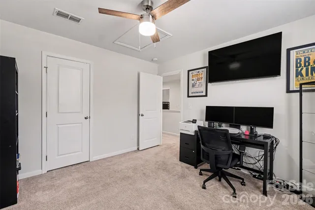 a room with furniture and window