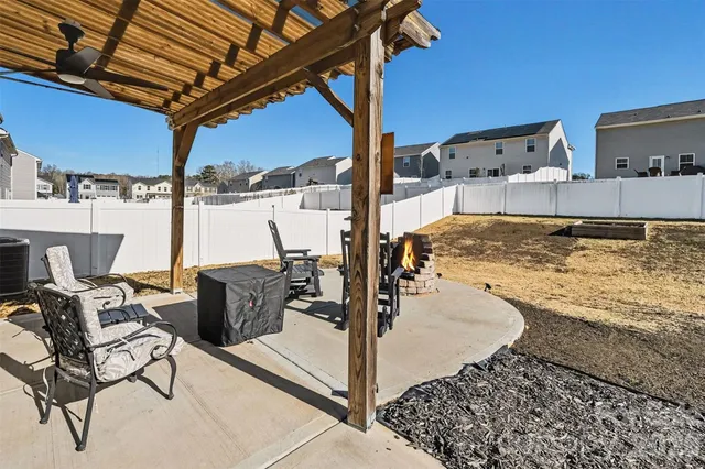 a view of a swimming pool with a patio