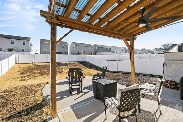 a view of house with yard